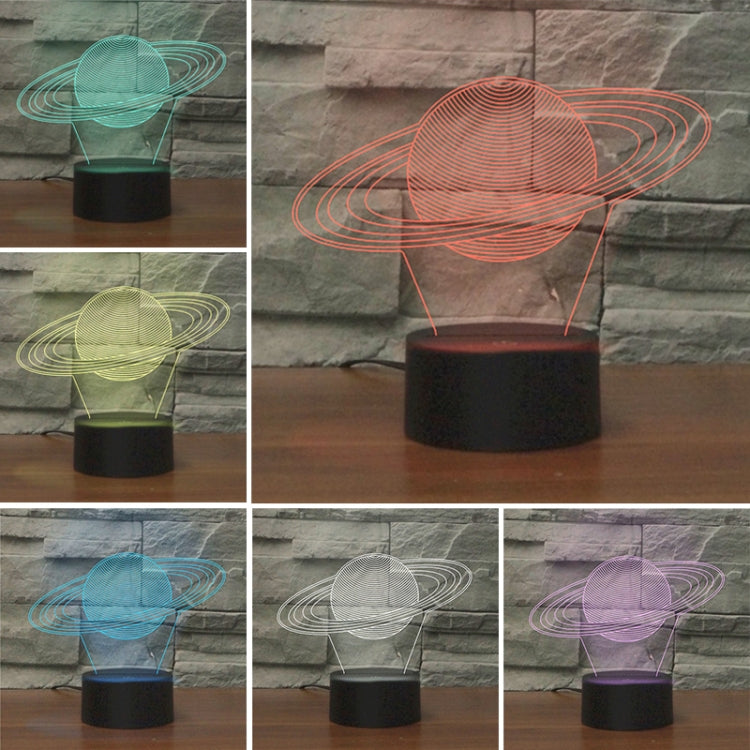 Saturn-shaped LED table lamp with multi-color swirl projection and black base