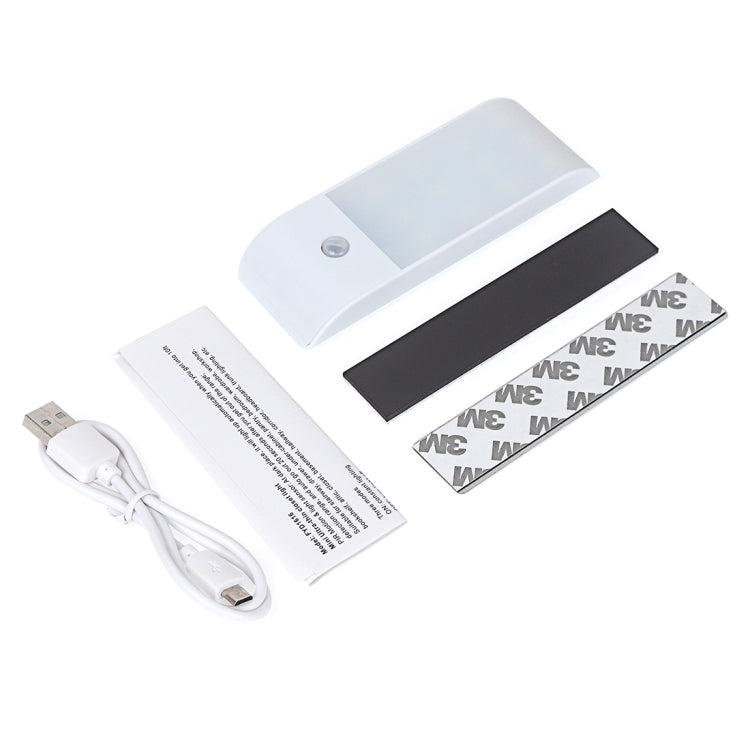 USB rechargeable LED light kit: white bar, black strips, instructions, and USB cable