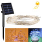 Solar fairy lights with clear wire and glowing LEDs shown around decorative shapes