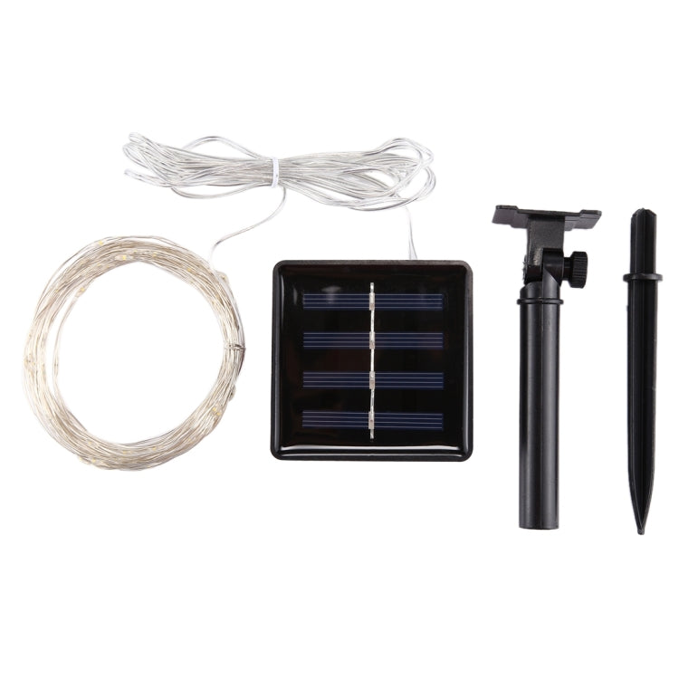 Solar fairy light kit with bundled clear wire, solar panel, and ground stake