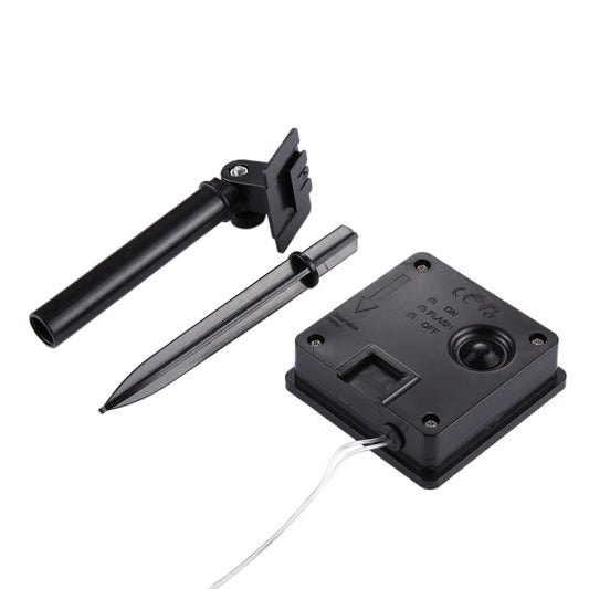 Solar fairy light components: stake, solar panel, and control box with cable