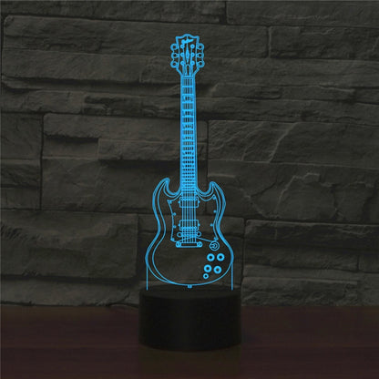 Blue guitar-shaped LED table lamp with 3D illuminated outline and black cylinder base.