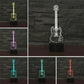Multi-color guitar-shaped LED table lamp set with blue, green, purple, and red designs.