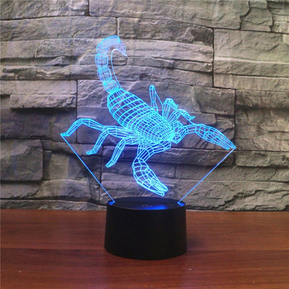 Blue glowing scorpion-shaped 3D LED table lamp on a black base.