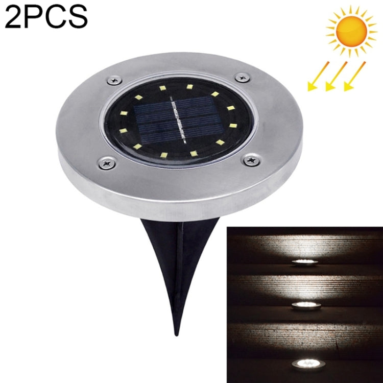 Solar ground LED light, 12 LEDs, round metal top with 3-prong stake