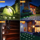 Two solar garden step lights with glowing LED spots, round caps