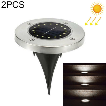 Solar-powered buried ground light with round stainless cap and spike stake, 16 LEDs