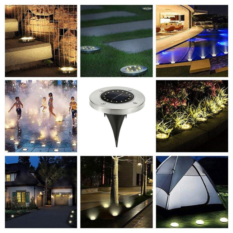 Solar LED buried ground light with round silver cap and multiple glowing landscape heads