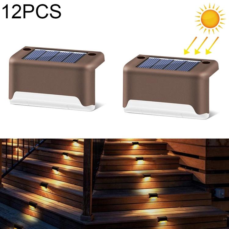 Brown solar LED stairway lights with warm white glow on outdoor steps