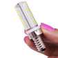 104-LED E14 filament LED bulb held in hand, clear glass with SMD LED strip rows