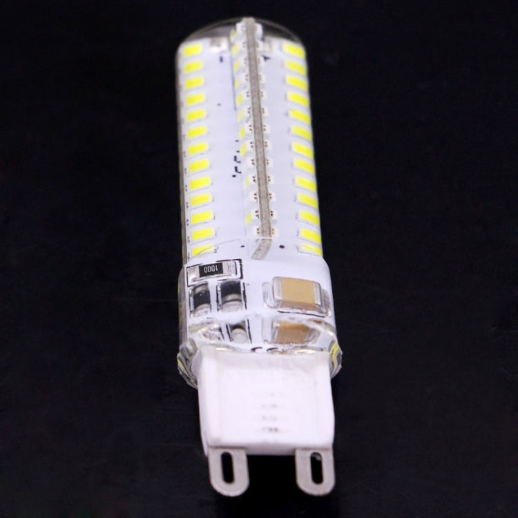 G9 LED light bulb front view with translucent cover and two-pin base, bright LED rows