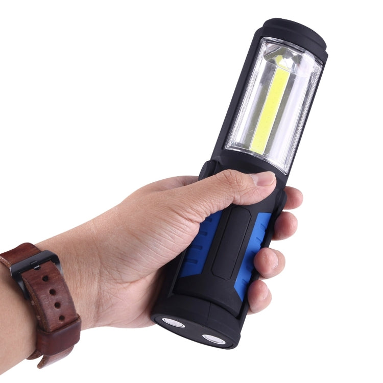 Blue handheld emergency work light with clear lens and vertical COB strip
