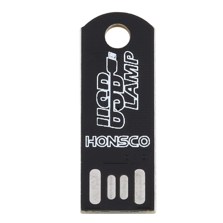 Back of black USB LED light board with printed text and mounting hole