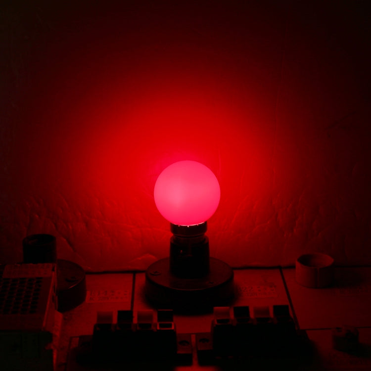 Glowing red LED light bulb with bright red illumination