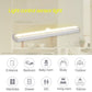 Warm white LED sensor light bar illuminating the inside of a cabinet area