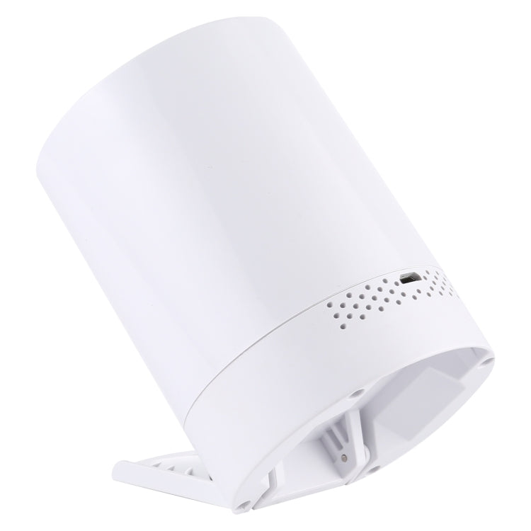 Voice-controlled LED laser starlight projection lamp, white side view with vent holes