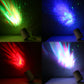 Voice-controlled LED laser starlight projection lamp projecting multi-color starburst patterns