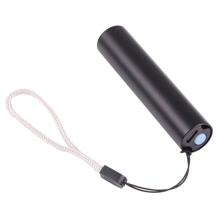 Mini flashlight with dark body, lanyard cord, and side mode button