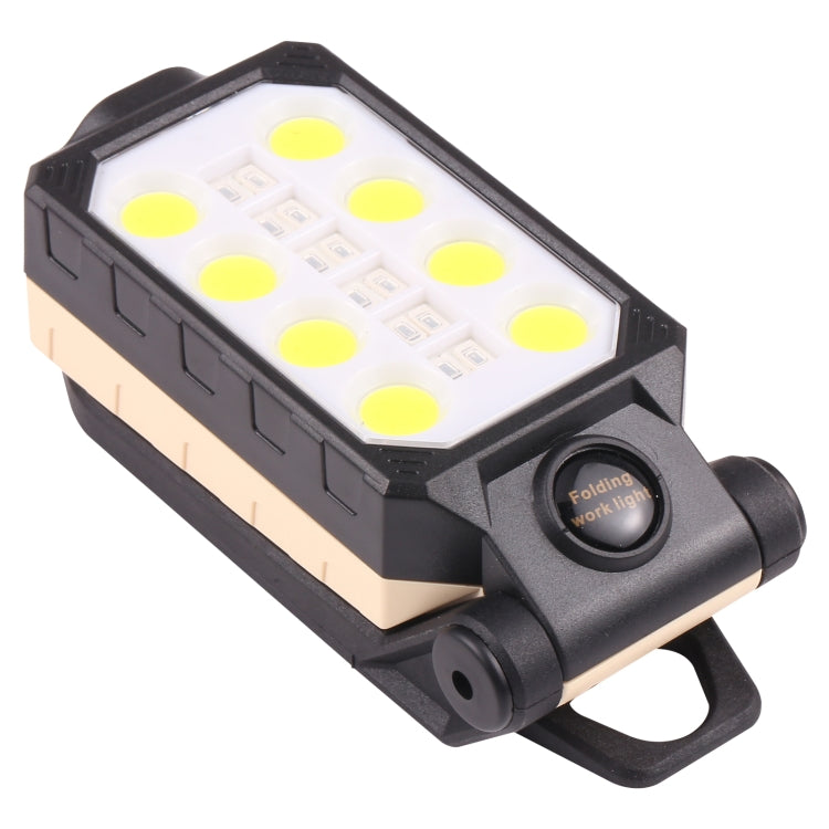 Folding LED work light with black housing and beige panel, round control on side