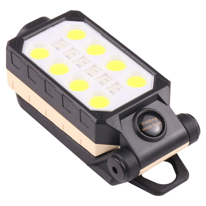 Folding LED work light with black housing and beige panel, round control on side