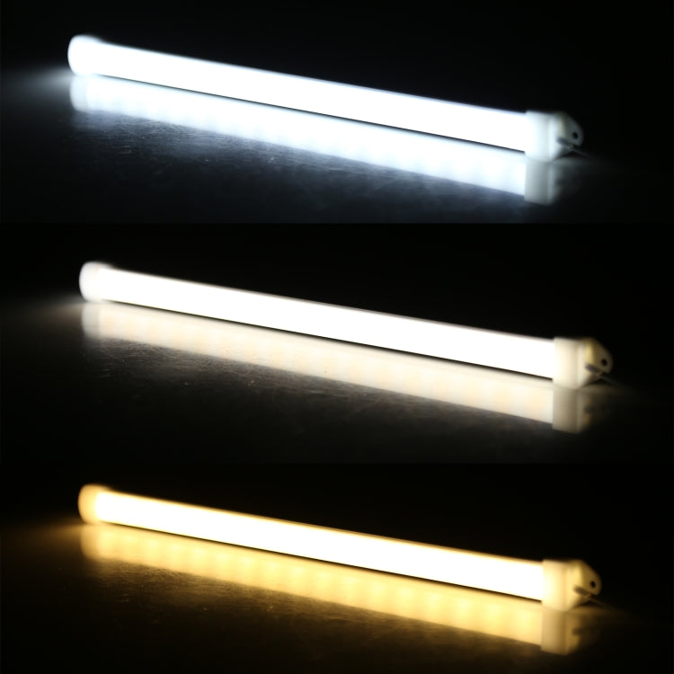 Three-color LED light tube glowing cool, warm, and amber tones