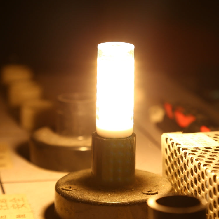 Dimmable E14 LED corn bulb emitting warm light, silver screw base