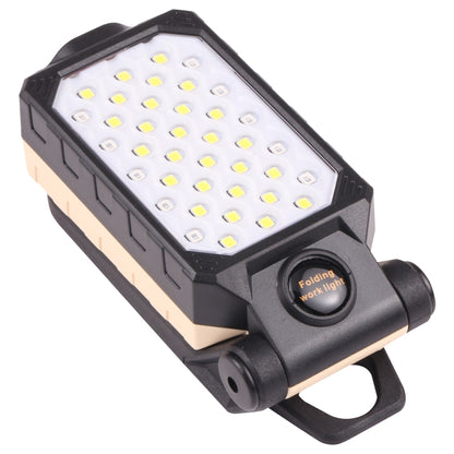 Folding LED work light with black housing and white LED panel