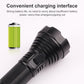 Black rechargeable flashlight showing charging interface area and blue power button