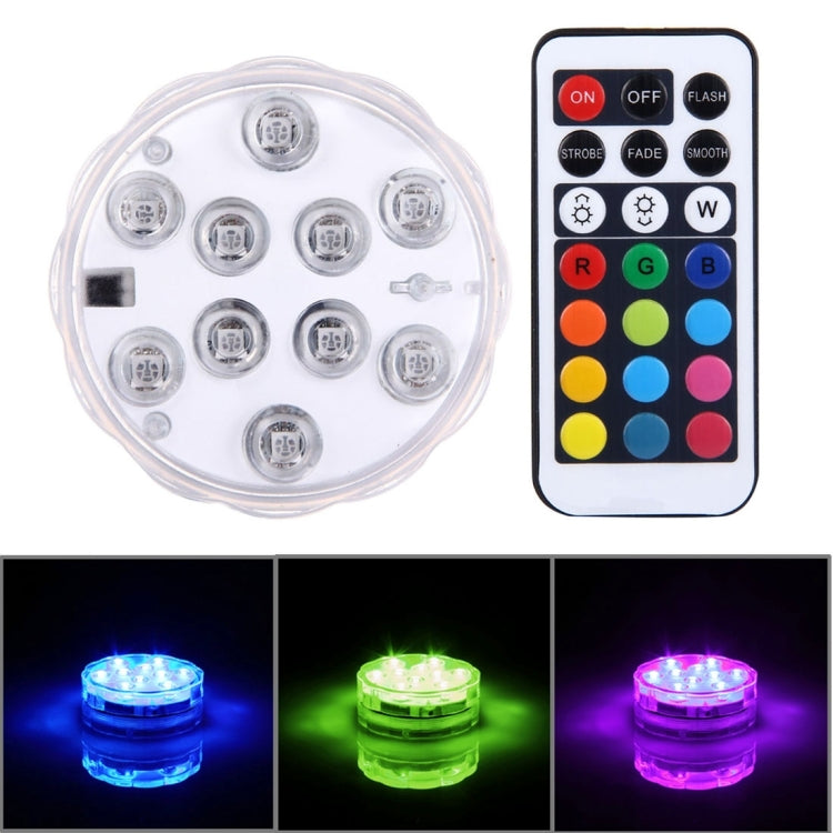 Remote-controlled clear LED cylinder light with 10 circular bulbs and handheld control unit