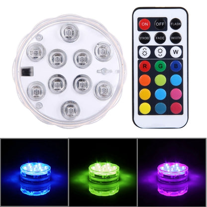 Remote-controlled clear LED cylinder light with 10 circular bulbs and handheld control unit