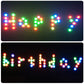 Remote-controlled LED cylinder light with multicolor dot patterns shaped like letters