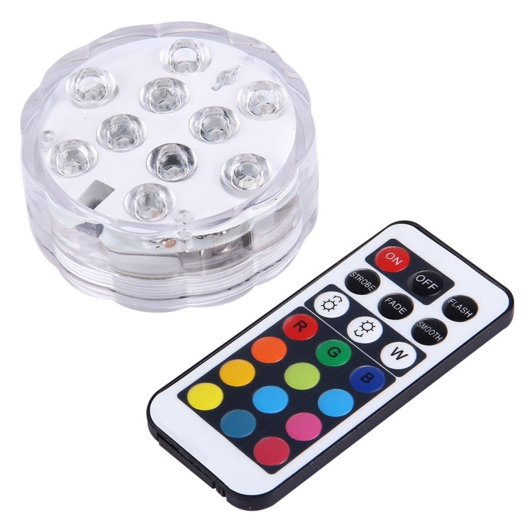 Clear LED cylinder light and remote with color buttons and ON/OFF controls