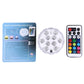 Remote-controlled LED cylinder light shown with packaging card and handheld remote