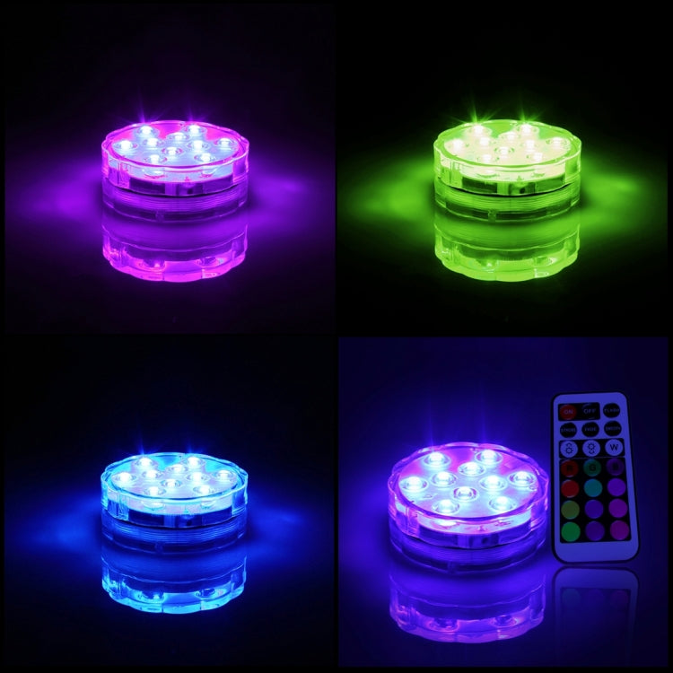 Remote-controlled LED cylinder glowing in purple, green, and blue colors