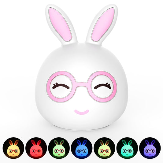 Pink 3D LED rabbit night light with white ears and round glasses, smiling face