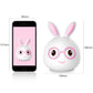 Rabbit 3D LED night light with round glasses and long ears, shown beside phone