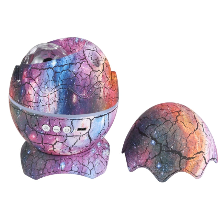 Cracked egg-shaped LED projection lamp with side control panel and speaker