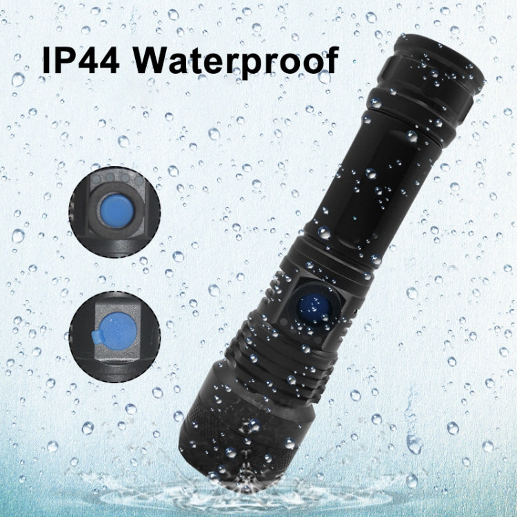 Black waterproof LED flashlight with blue button and water droplets on body.