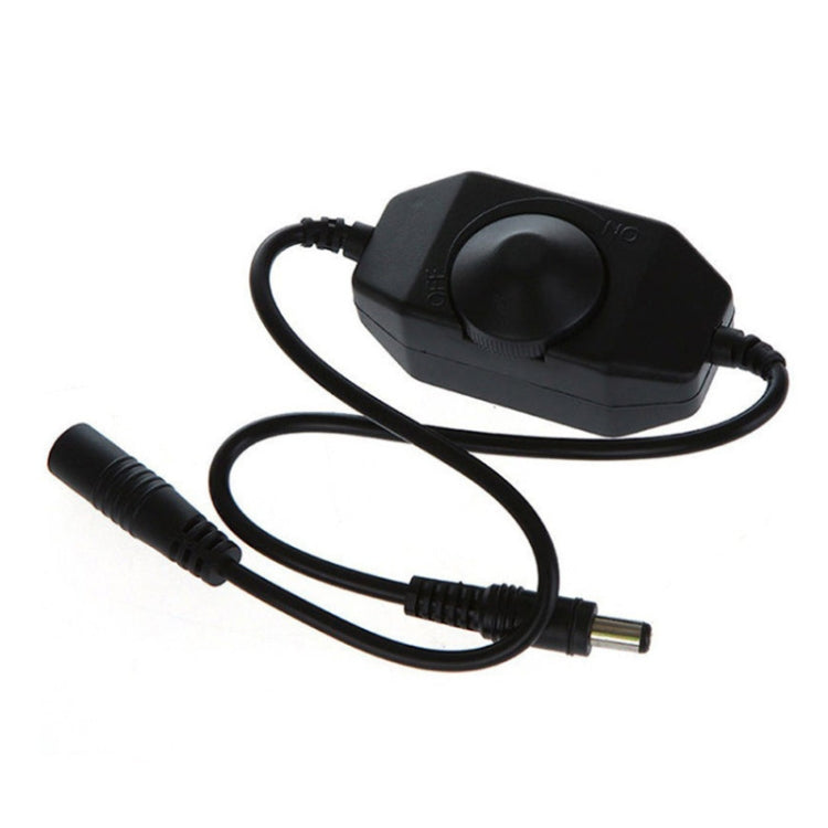 Black LED strip dimmer controller with large dial knob and attached power cord