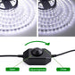 Black LED dimmer controller with round knob, connected cable, and brightness arrows