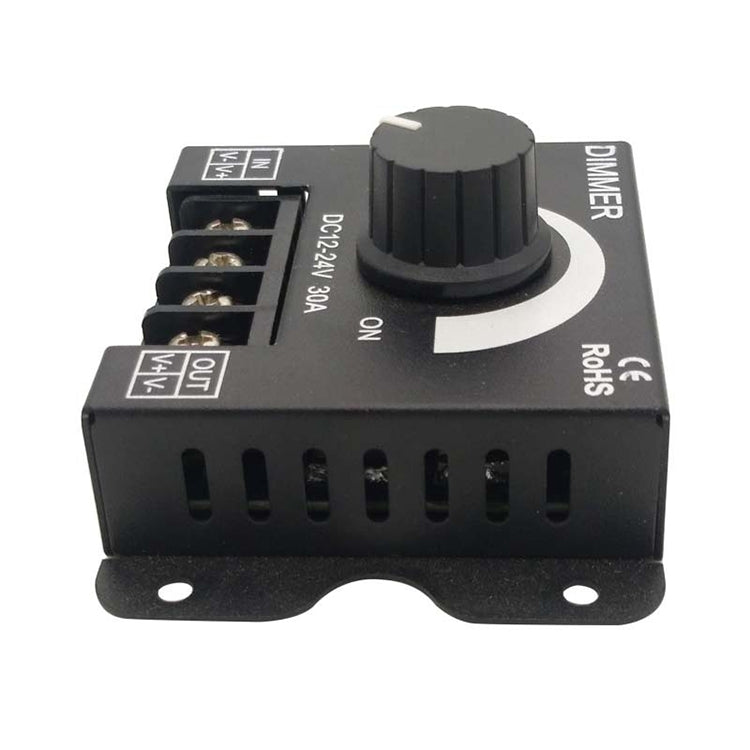 Black rotary dimmer module with dimmer knob and input/output terminal connectors