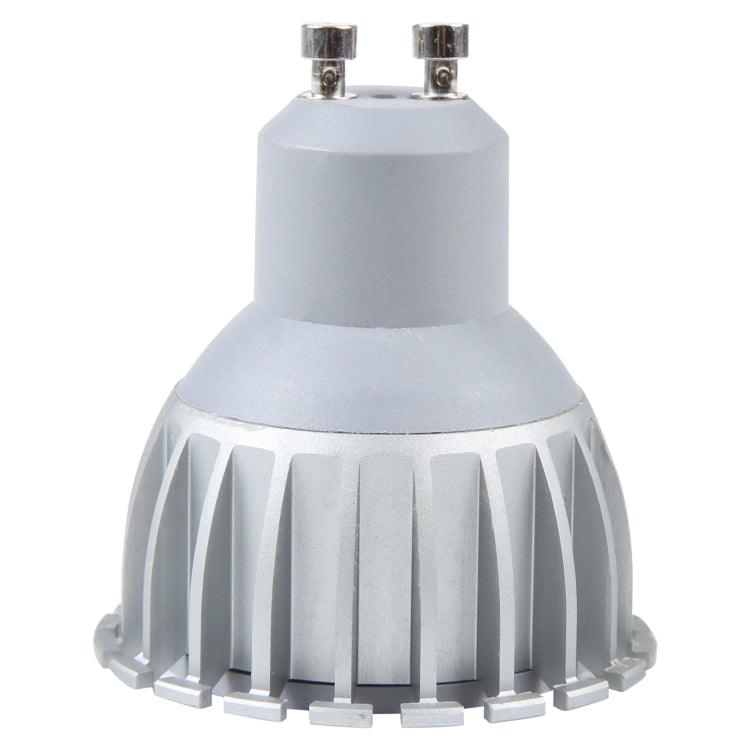 White GU10 LED spotlight with ribbed heat sink and dual pins, front view