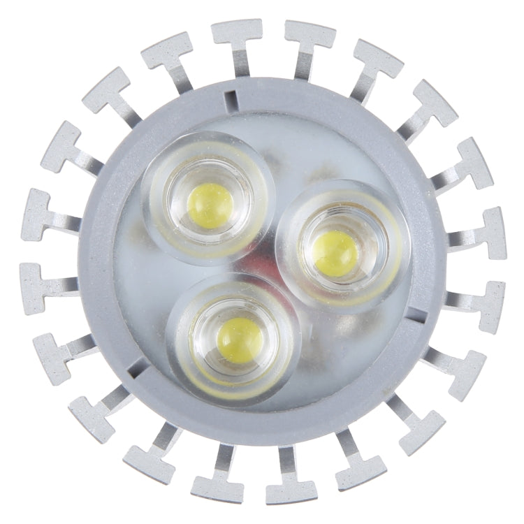 White GU10 LED spotlight showing four yellow LED emitters under clear lens