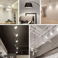 GU10 LED spotlights on a ceiling track, multiple lights switched on