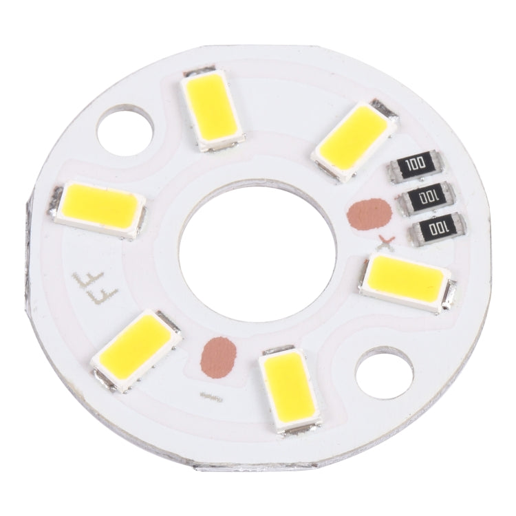 Warm white LED module with six SMD 5730 LEDs and circuit markings, circular