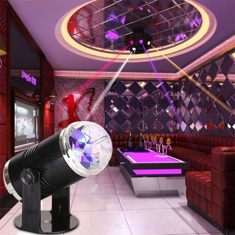 Rotating LED stage light with clear magic ball head on black base
