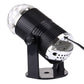 Black mini LED stage light with ribbed barrel and clear rotating disco ball lens