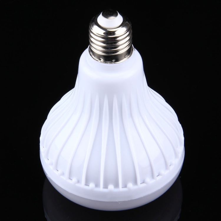 White LED music bulb with grooved diffuser and silver E26 screw top