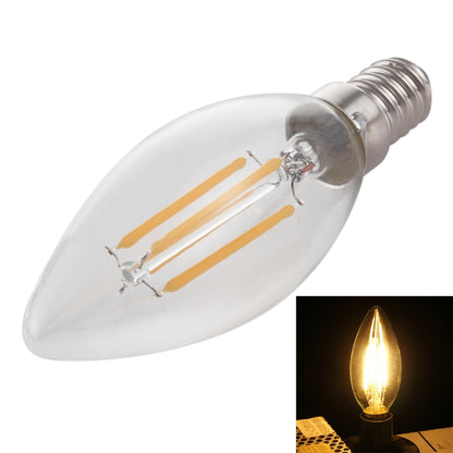 Retro LED filament bulb with clear glass and E14 screw base, warm yellow filaments