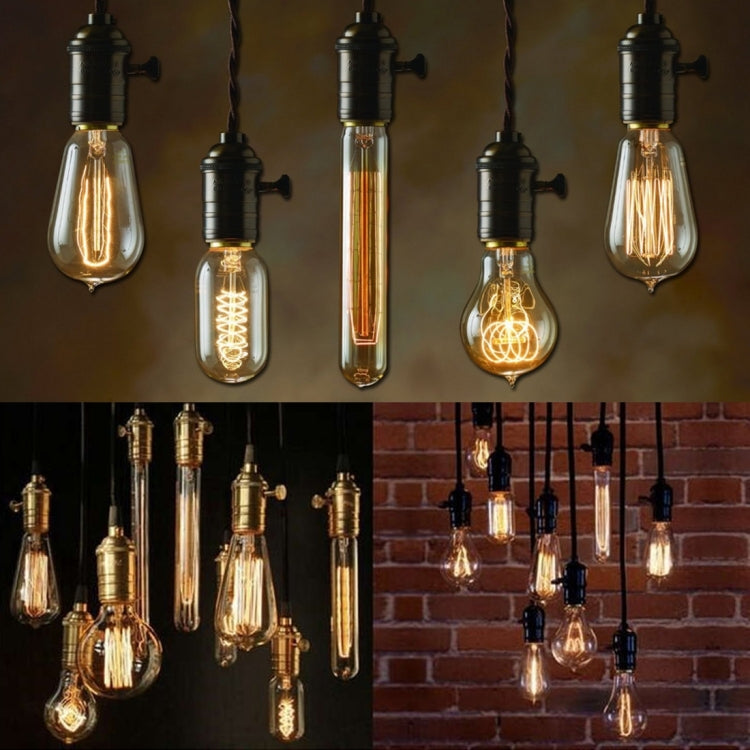 Multiple retro LED filament bulbs with glowing filaments in pendant fixtures
